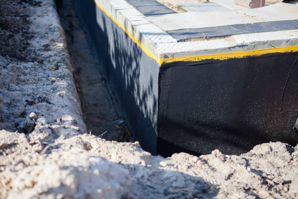 Residential Interior Drainage System installation at a Oberlin, KS home by SJ Waterproofing Pros